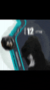 a blurred image of a dog with the number 12 visible