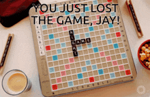 a scrabble board with the words you just lost the game jay on it