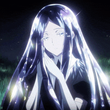 a woman with long purple hair is covered in a veil of diamonds