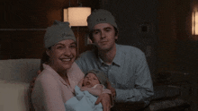 The Good Doctor Family Photo GIF - The Good Doctor Family Photo Mother And Father With Baby GIFs
