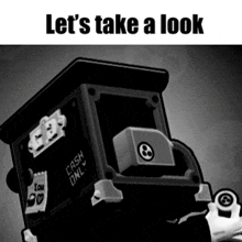 a black and white image with the words let 's take a look on the bottom