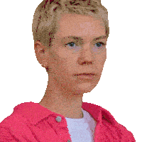 a close up of a woman 's face wearing a pink shirt