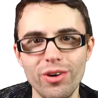 a close up of a man wearing glasses and making a funny face