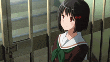 a girl in a school uniform with a green bow on her head