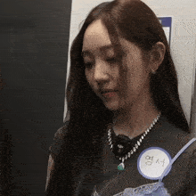 a woman with a name tag that says ' yeong ' on it