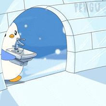 a penguin is washing its hands in front of an igloo that says penguin