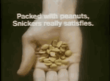 Packed With Peanuts, Snickers Satisfies GIF - Snickers Snicker Candy GIFs
