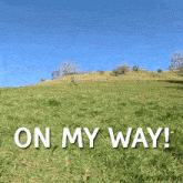 a person running on a hill with the words on my way
