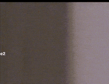 a close up of a person 's head with a blurred background and a few dots on it .