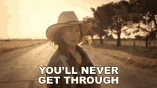 Youll Never Get Through Reba Mcentire GIF - Youll Never Get Through Reba Mcentire Somehow You Do Song GIFs