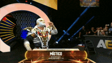 a wrestler named mistico is on the stage
