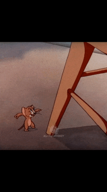 a cartoon of jerry standing next to a chair with a watermark that says ' jerry ' on it