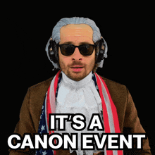 a man wearing a wig and headphones says it 's a canon event