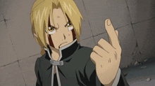 edward elric from fullmetal alchemist shows his middle finger