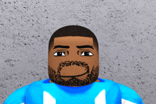 a man with a beard is wearing a blue shirt with the letter m on the front