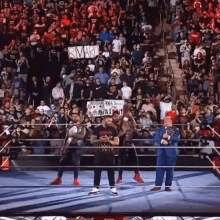 a wrestling ring with a sign that says rmark