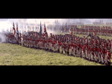 a large group of soldiers standing in a field