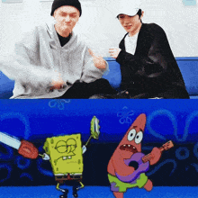 two men are sitting on a blue couch next to a cartoon of patrick playing a guitar