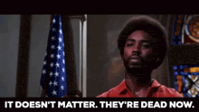 a man stands in front of an american flag and says it does n't matter