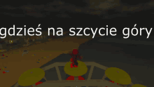 a ferris wheel with the words gdzie na szczycie góry written on it
