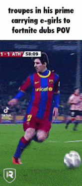 a soccer player wearing a unicef jersey is running with the ball