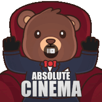 a teddy bear sitting in a red chair with the words absolute cinema written below him