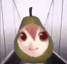a pear with a bird on it 's head is hanging from a string .