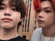 two young men with red hair are posing for a picture