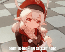 a picture of a girl with the words oomfie looking streamable below her