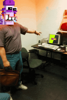 a man in a purple shirt with a pixelated face pointing at a computer screen