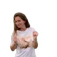 a woman wearing a white t-shirt that says follow on it