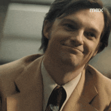 a close up of a man 's face with the word max on the bottom right