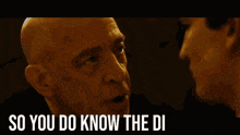 a bald man is talking to another bald man with the words so you do know the di written on the bottom