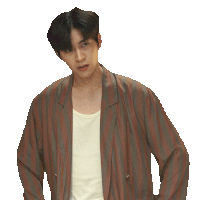 a young man wearing a striped jacket and a white shirt