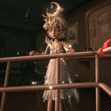 a girl in a fairy costume stands on a railing