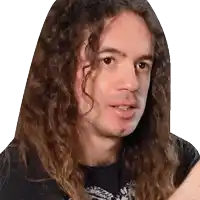 a man with long curly hair and a nose ring is wearing a black shirt