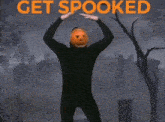 a man with a pumpkin on his head is dancing in a cemetery with the words get spooked written in orange