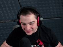 a man wearing headphones is making a funny face and says ooohhhhh ..