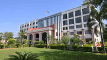 a large white building with the words the united international school on the top