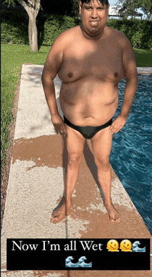 a man in a bathing suit is standing next to a pool with the words now i 'm all wet on the bottom