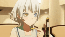 a girl with white hair and two different colored eyes