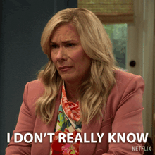 a woman in a pink jacket says i don t really know