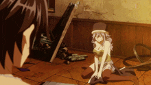 a girl in a hat is kneeling down in a room