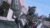 a monster with a sword and a shield standing in front of a building