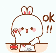 a cartoon rabbit is sitting at a table writing on a piece of paper and saying `` ok '' .