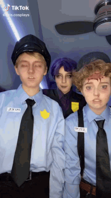 a group of people dressed as police officers with one wearing the name mike