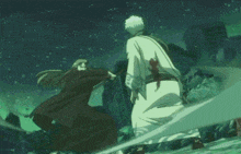 a man and a woman are standing next to each other holding hands