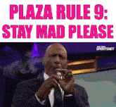 a man in a suit smoking a cigarette with the words plaza rule 9 stay mad please above him