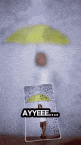 a picture of a person holding an umbrella with ayyeee written underneath it