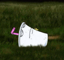 a cartoon cup with a straw sticking out of it is laying in the grass .